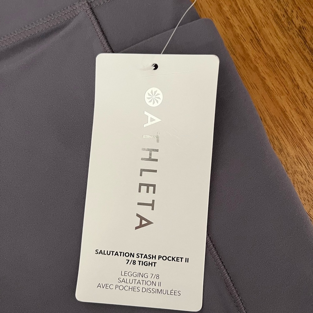 ATHLETA NWT salutation stash pocked leggings